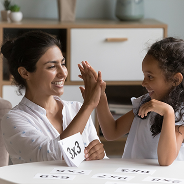 1on1 Home Tution tutor Teaching maths with happy students