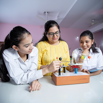 1on1 Home Tution tutor and Student learning science experiment